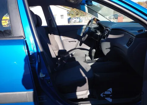 2009 Kia Rio Lx from USA, damaged, VIN KNADE223796515591